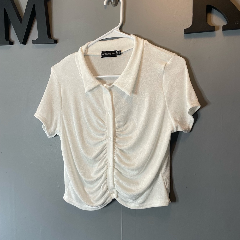 PrettyLittle Things white stretchy polo short sleeve top size 12. Fits Like A 10